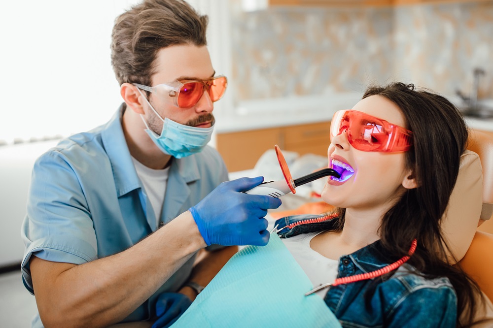 dentist performing deep dental cleaning